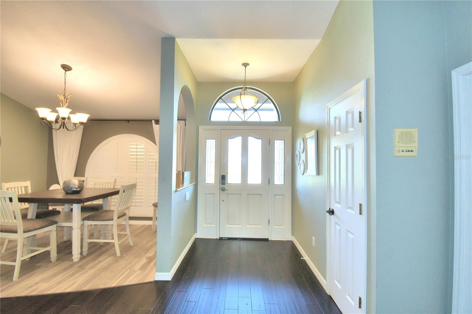 View of formal dining room and foyer-1.