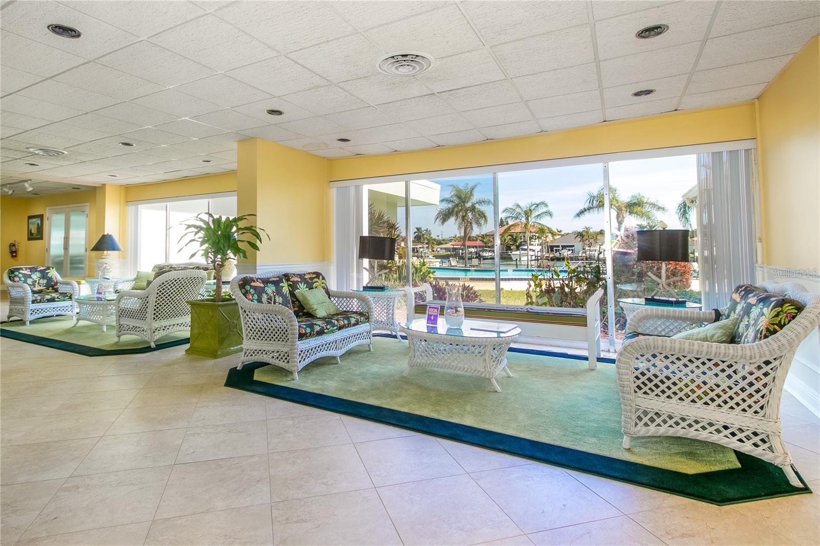 LOBBY AREA WITH POOL VIEWS