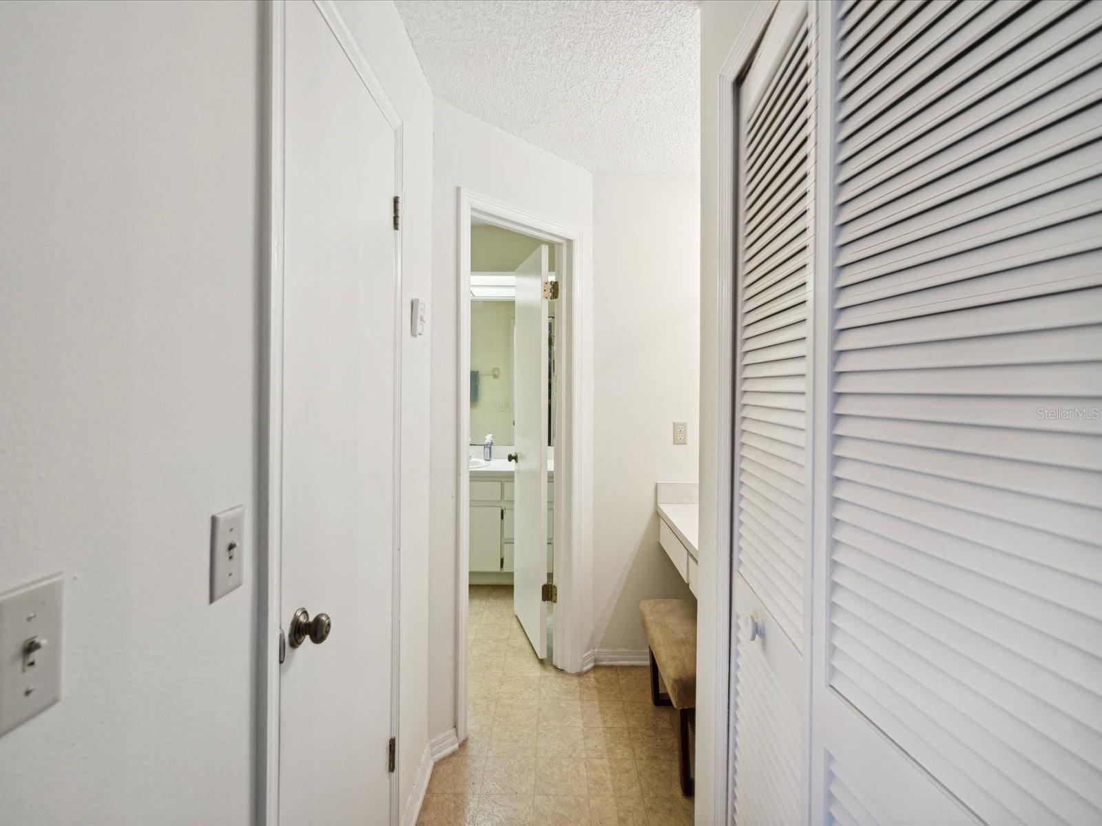 EN-SUITE BATHROOM WITH VANITY SPACE AND STANDING SHOWER