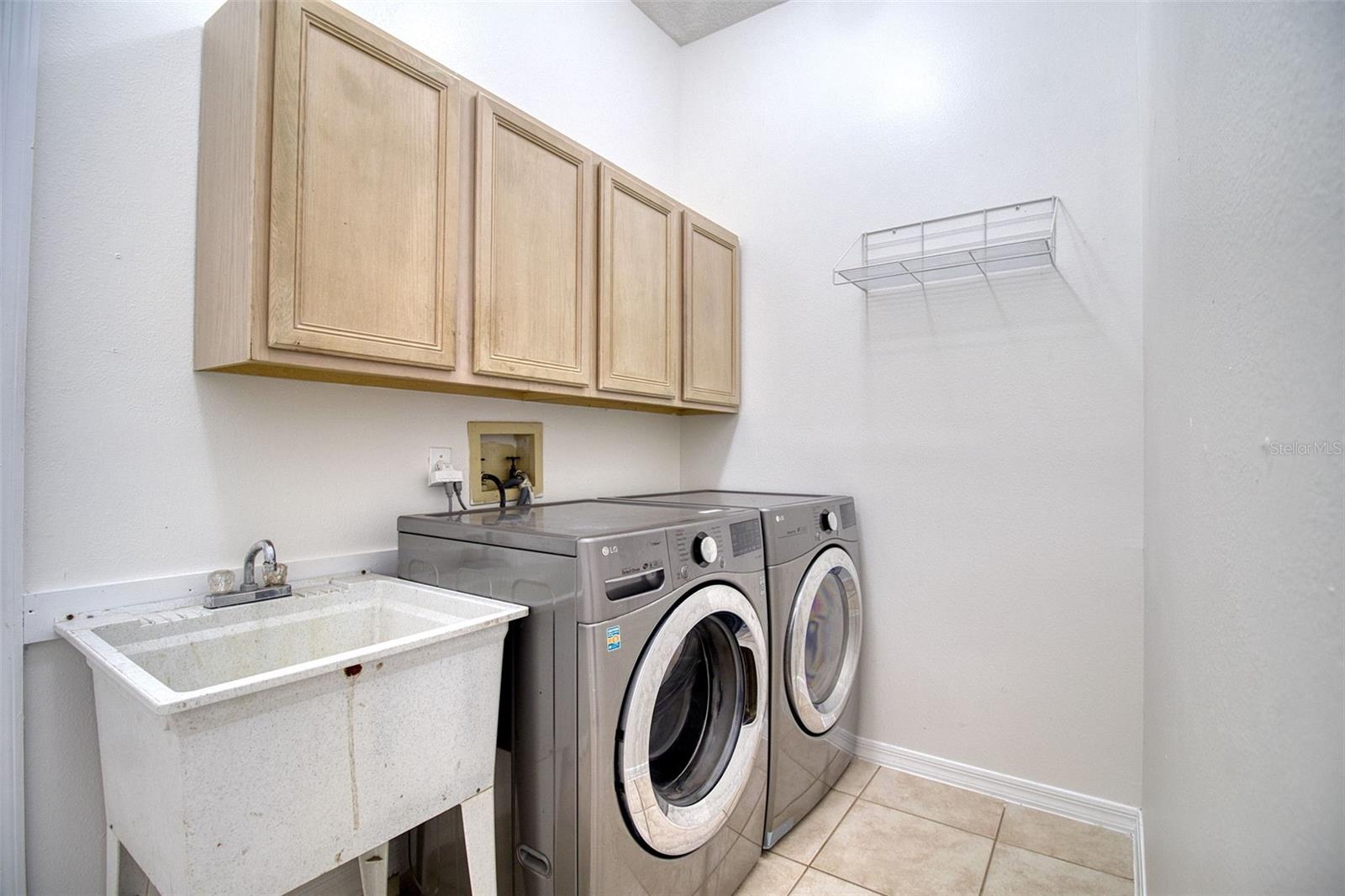 Laundry Room w/Front Load LG Washer & Dryer