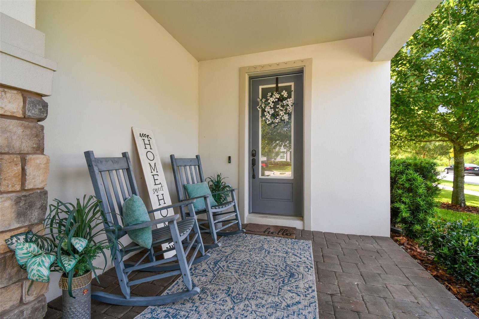 Covered Front Porch Area with Pond Views