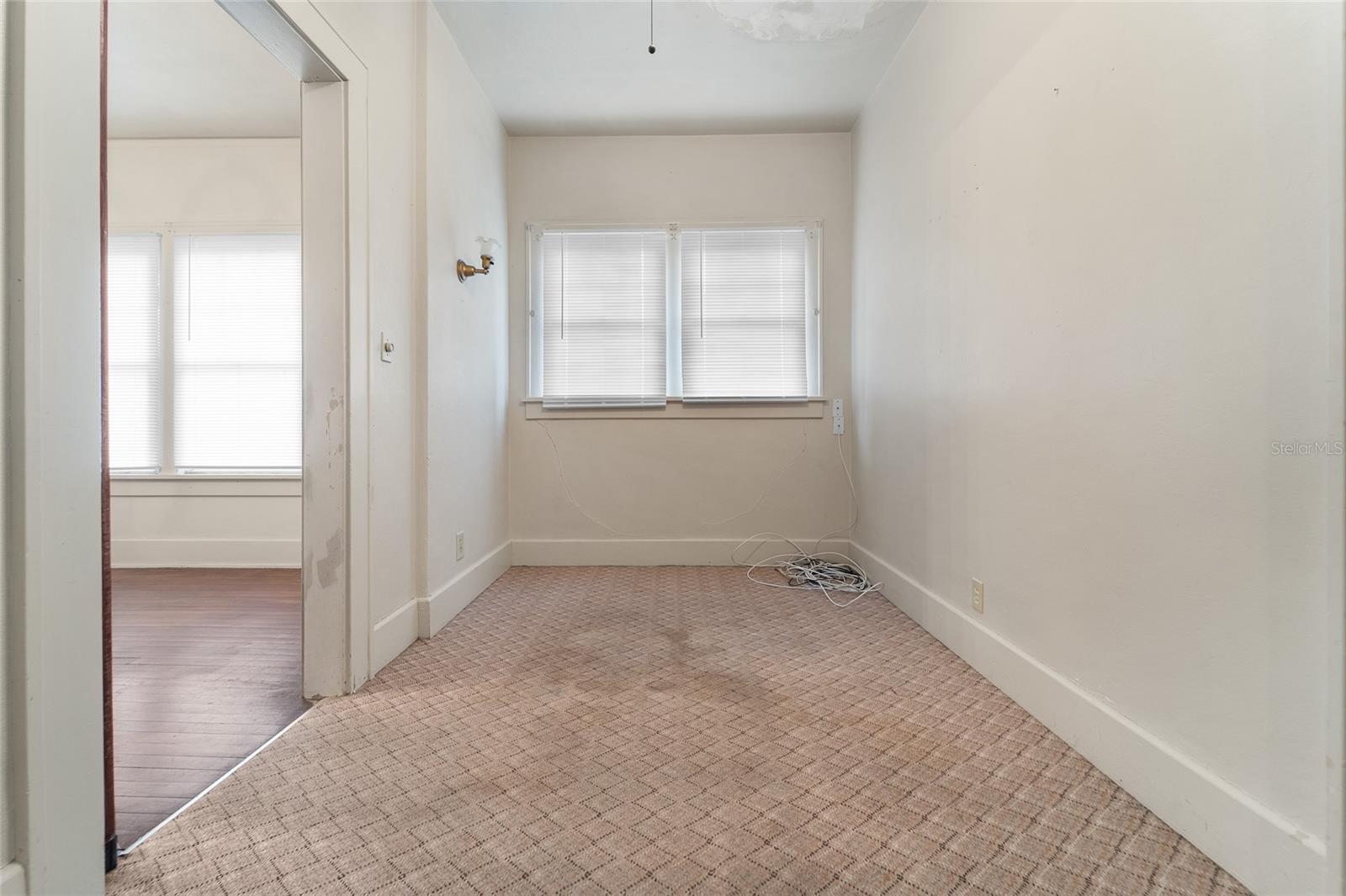 Dinette - Breakfast Room Located Between Kitchen and Formal Dining Room