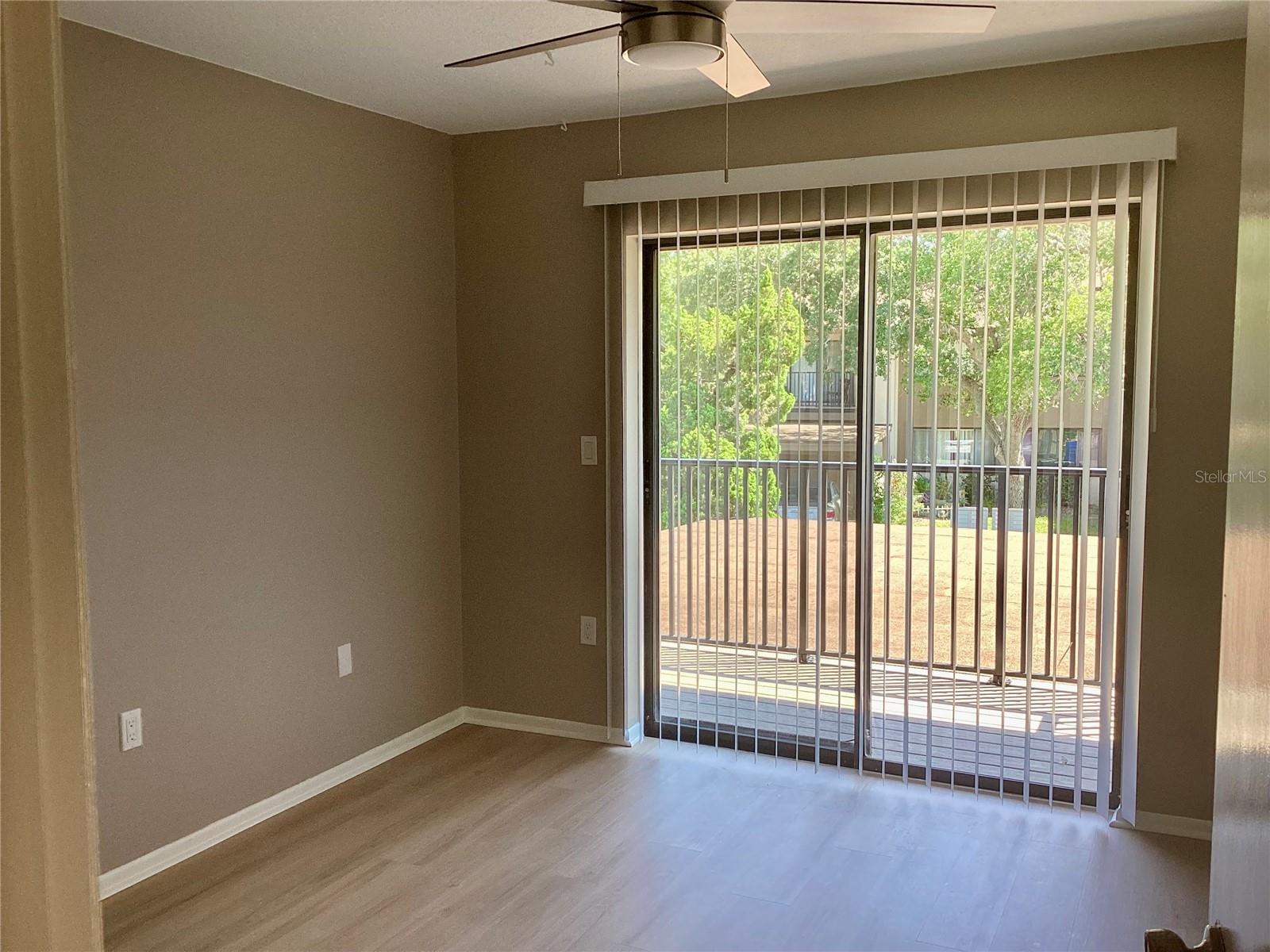 Guest bedroom with private balcony.