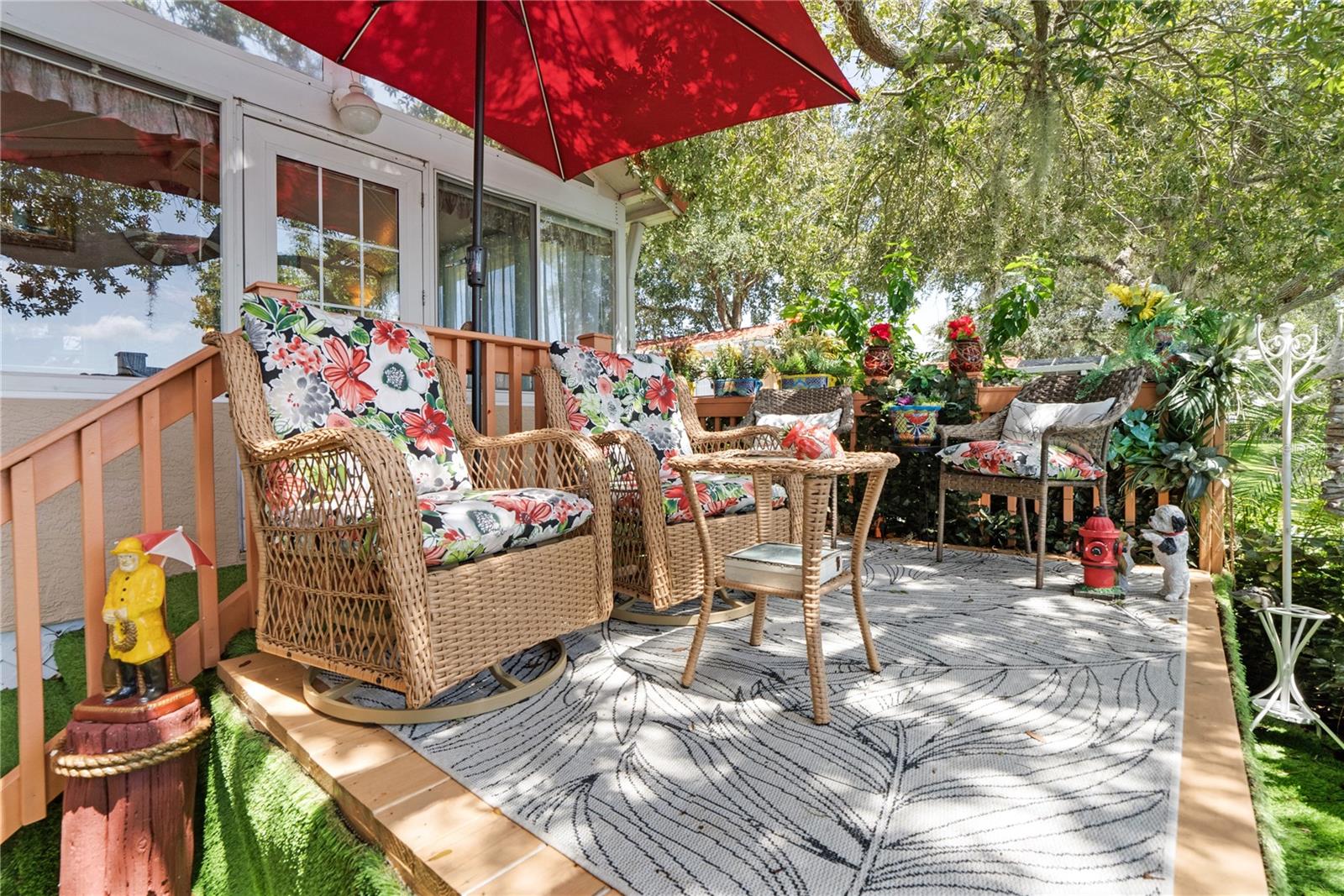 All patio furniture, umbrella, planters, and yard art will convey with the sale.