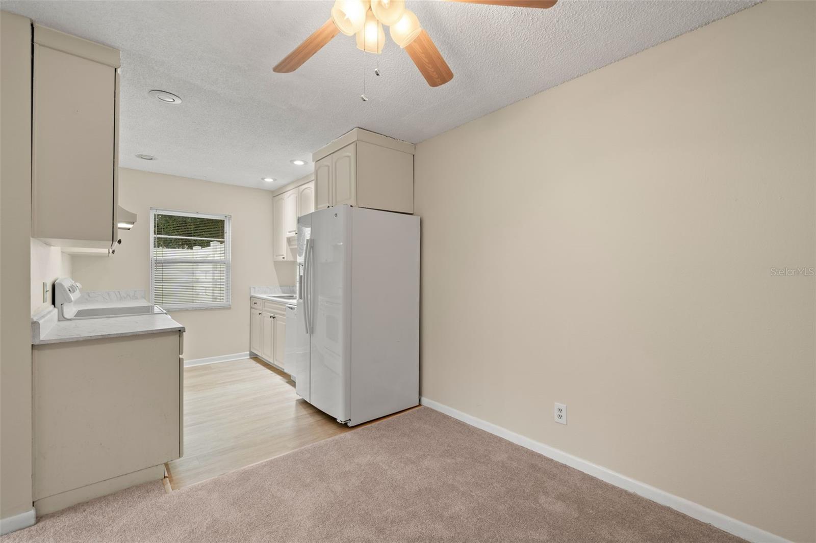 view from dining room to kitchen