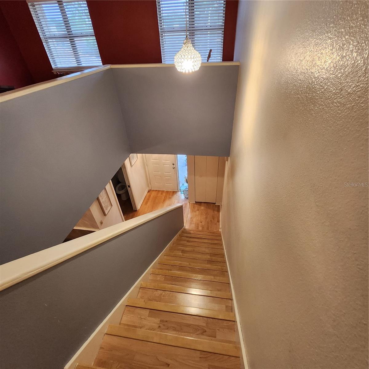 Stairs leading to loft/sitting area 2 bedrooms and full bath