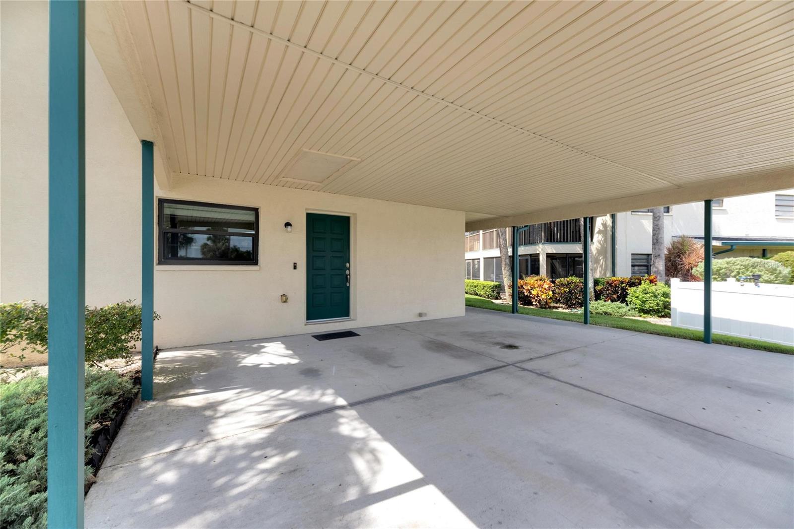 Covered Carport w/Room for a Golf Cart & Two Cars