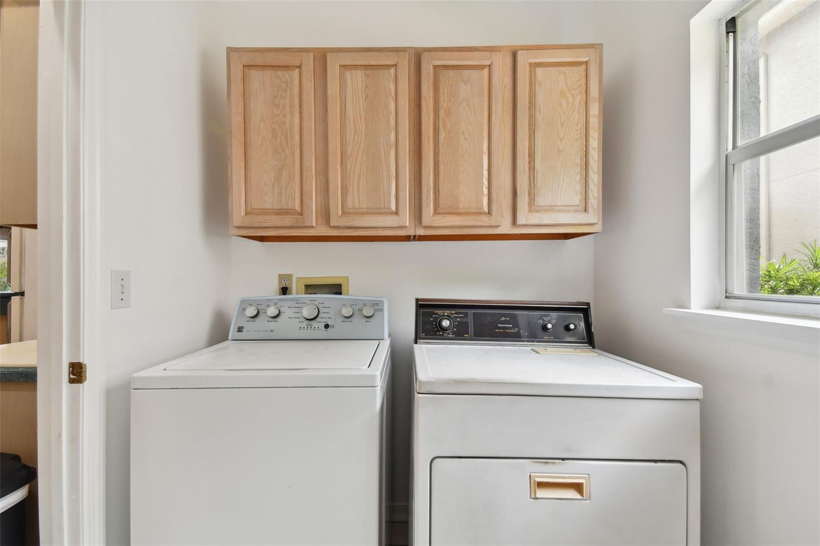 Laundry Room off Kitchen Leads to Garage