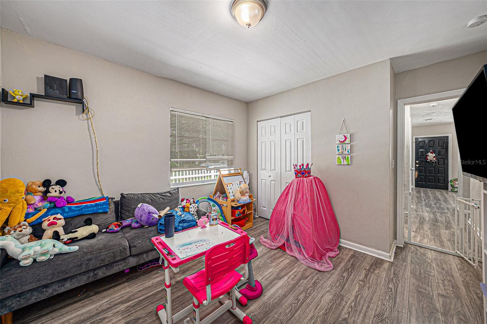 Bed Room 1, has walk through to Primary Bedroom