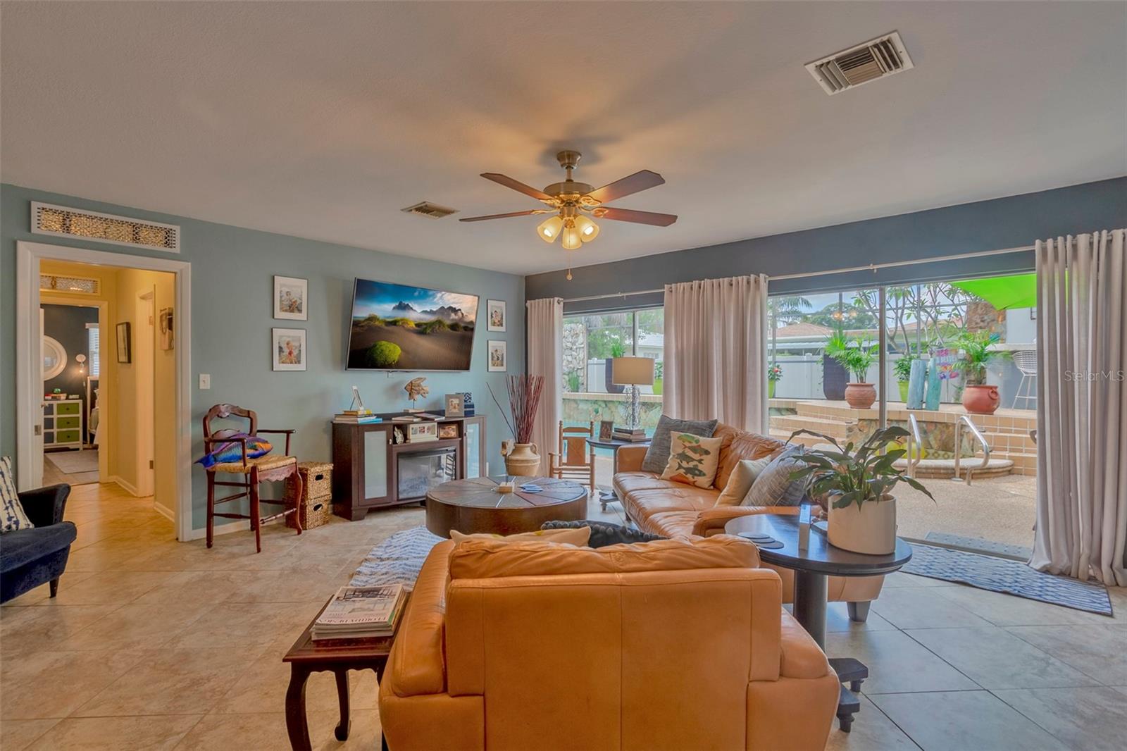 Family Room with wall of Sliding Glass Doors