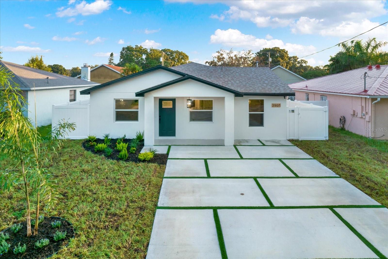 Brand new roof, driveway, impact windows, paint, sod, & vinyl fencing (2024)