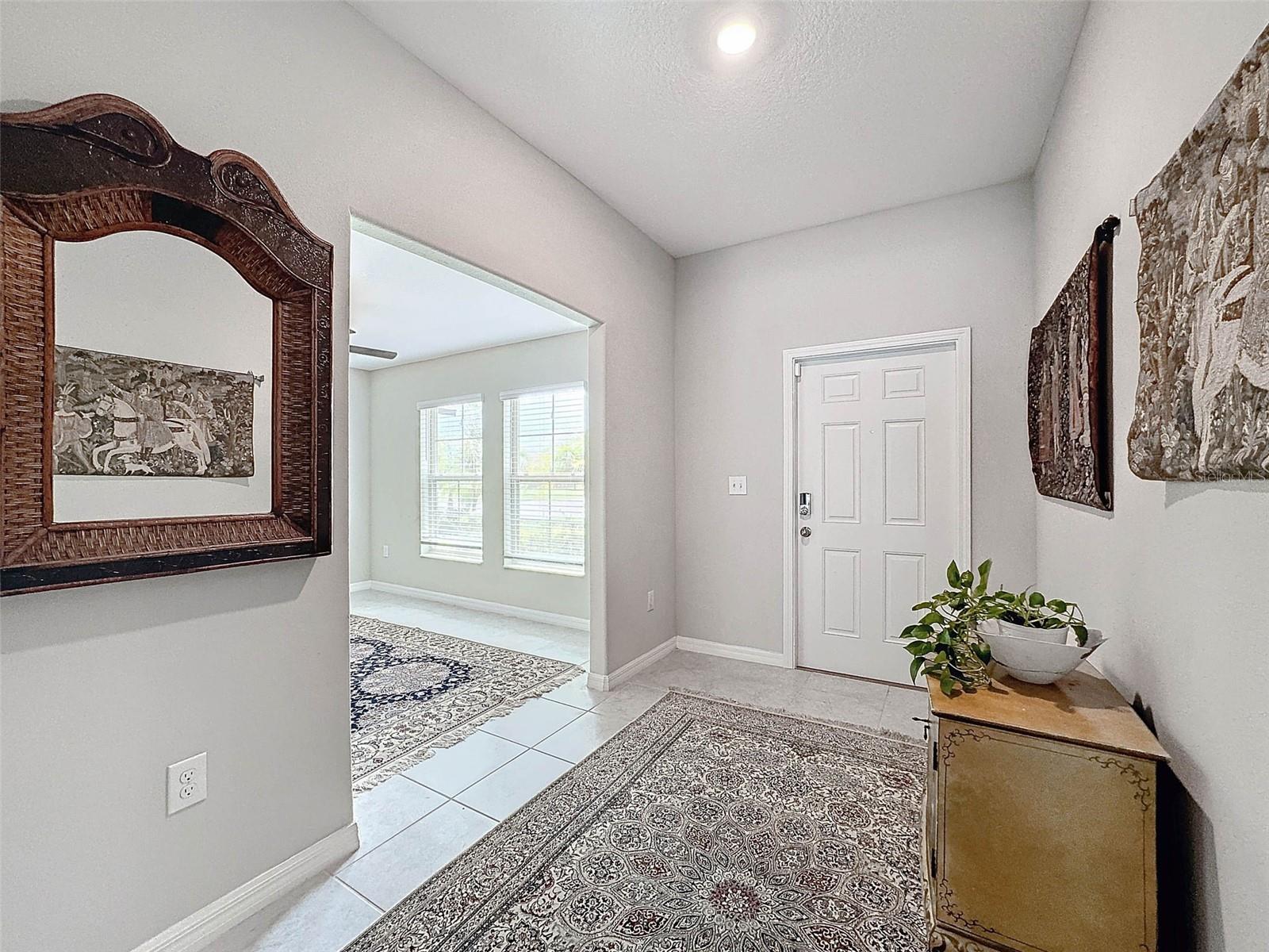 ELEGANT FOYER ENTRY WITH FLEX SPACE/ OFFICE UP FRONT