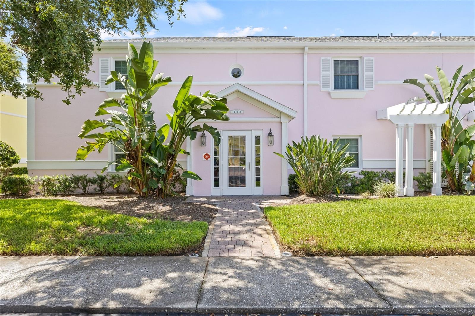 Pretty in Pink! Steps from parking spaces!