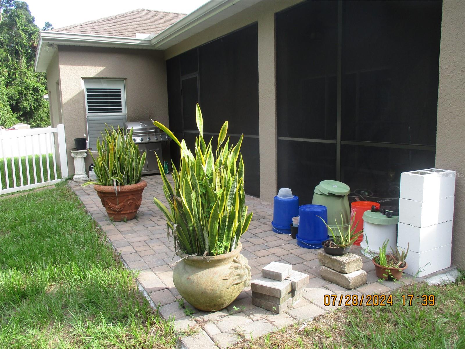 Patio with screened in lanai.