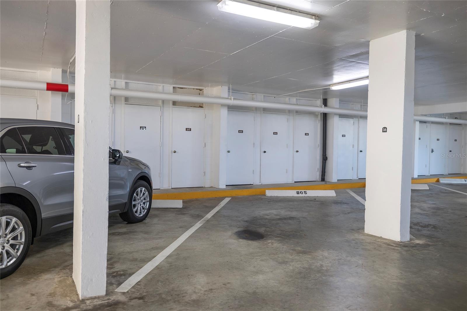 Under-Building Parking with Storage Unit