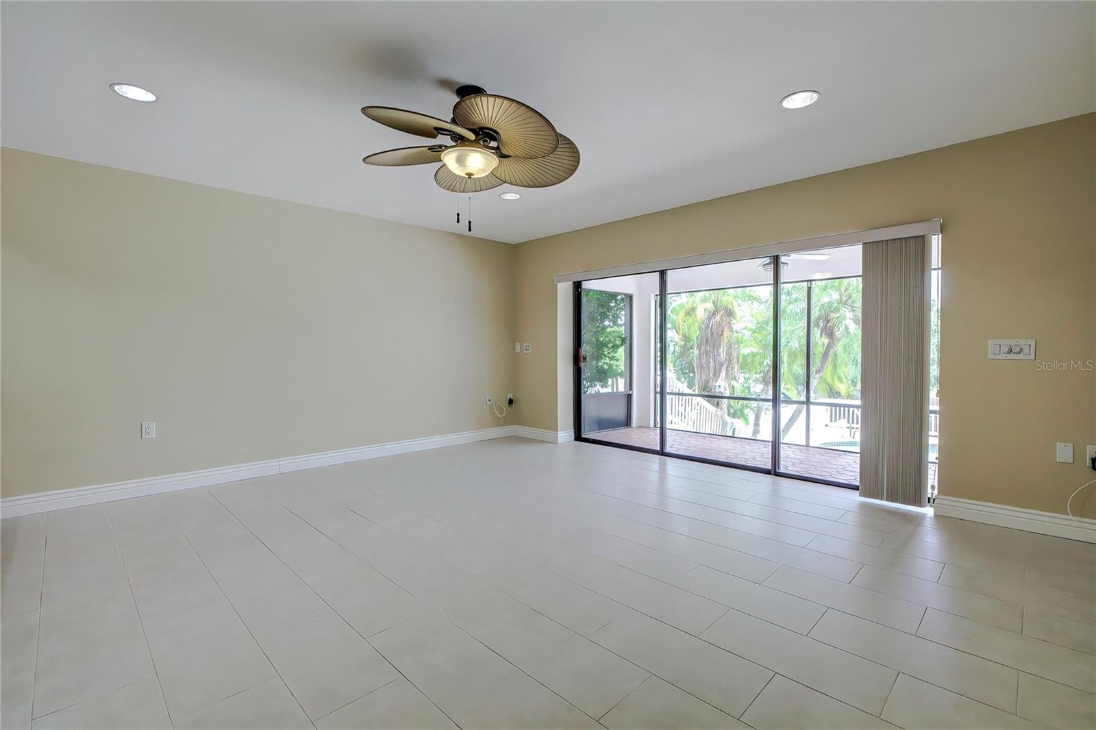 Downstairs living area with access to screened porch.