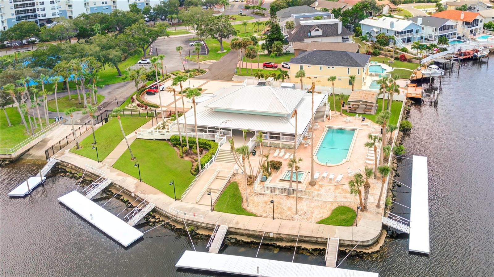 Private clubhouse with pool, hot tub, docks and boat ramp.