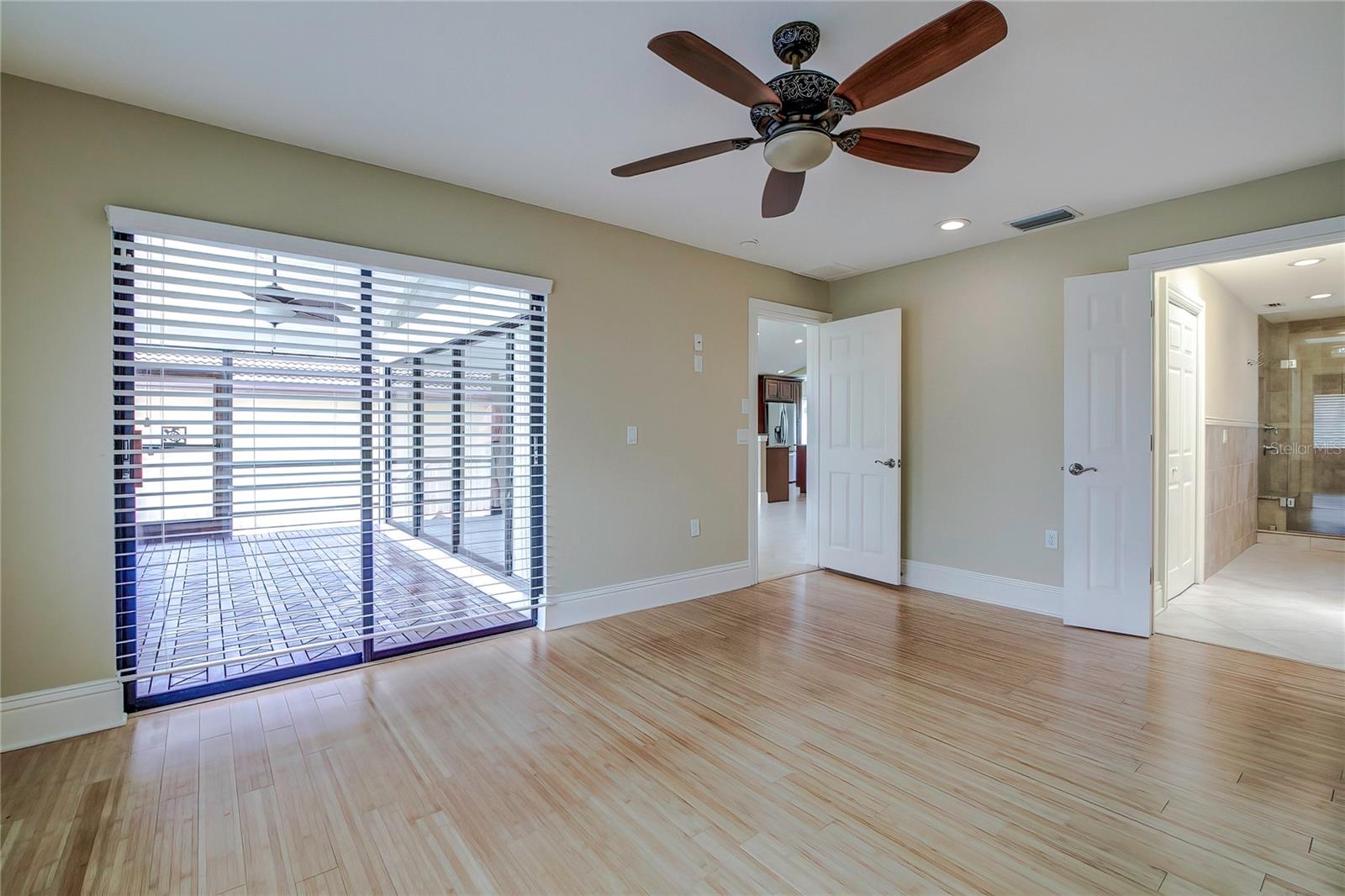 Living room with access to screened porch and waterview