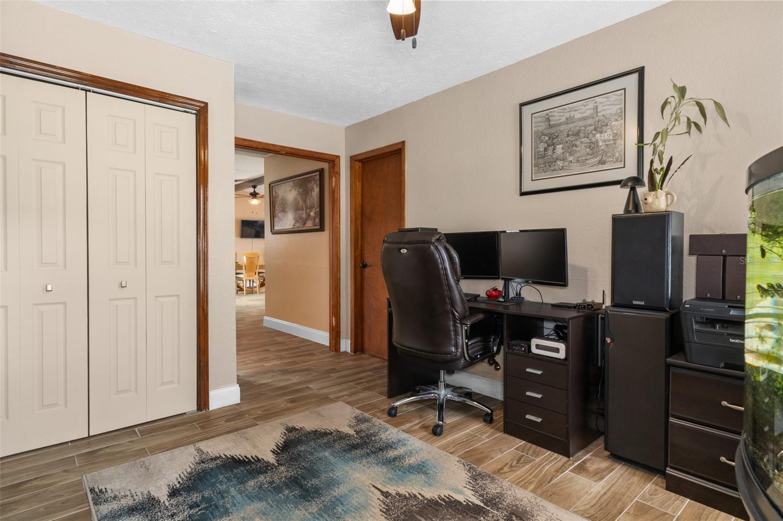 Bedroom 2 with Wood Look Tile Flooring