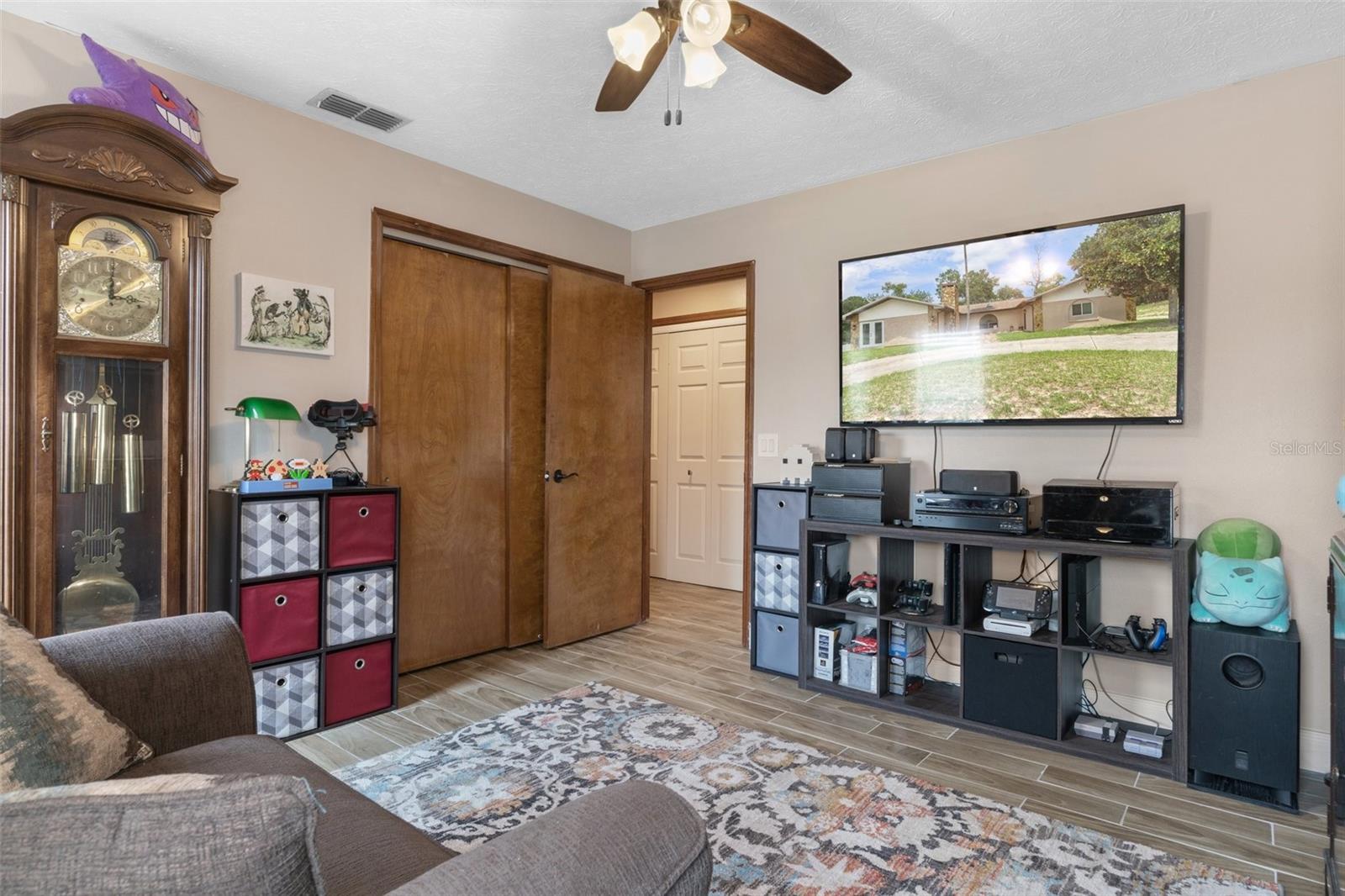 Bedroom 3 with Wood Look Tile Flooring