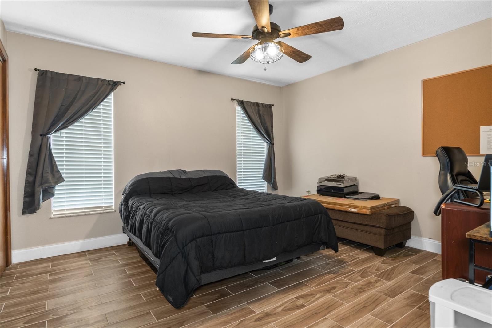 Bedroom 4 with Wood Look Tile Flooring