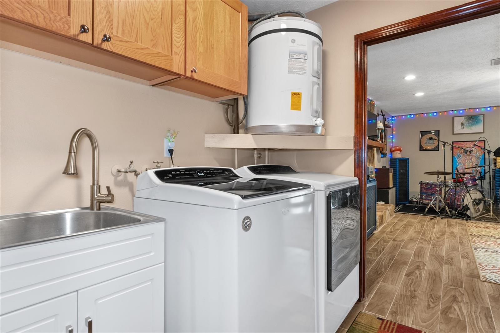 Laundry Room with Sink and Cabinets