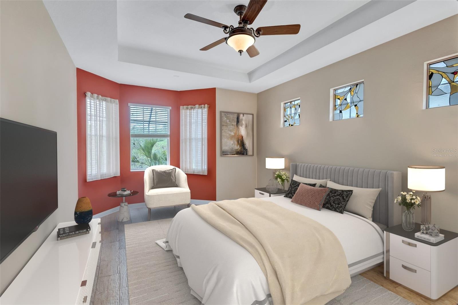 *Virtually staged* Spacious primary bedroom with vaulted ceilings