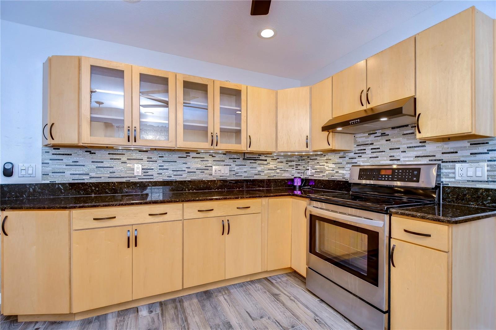 Granite countertops and above and below cabinet lighting!