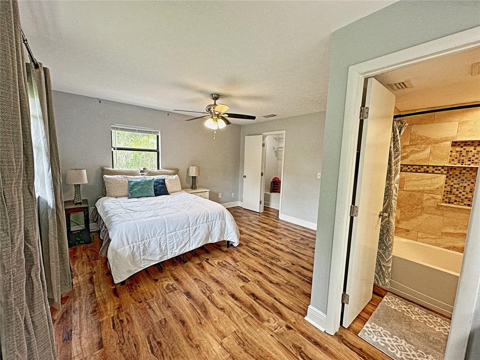 The primary bedroom with attached en suite.