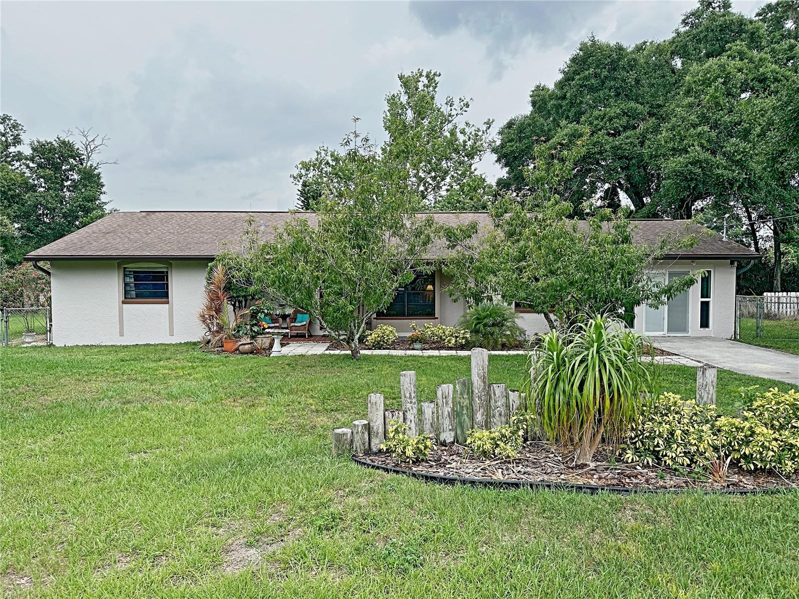 The property boasts mature fruit trees.