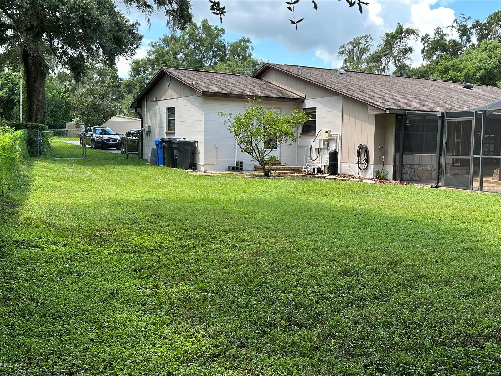 The side yards are fully fenced and each have space for 2 or 3 trailers storage.