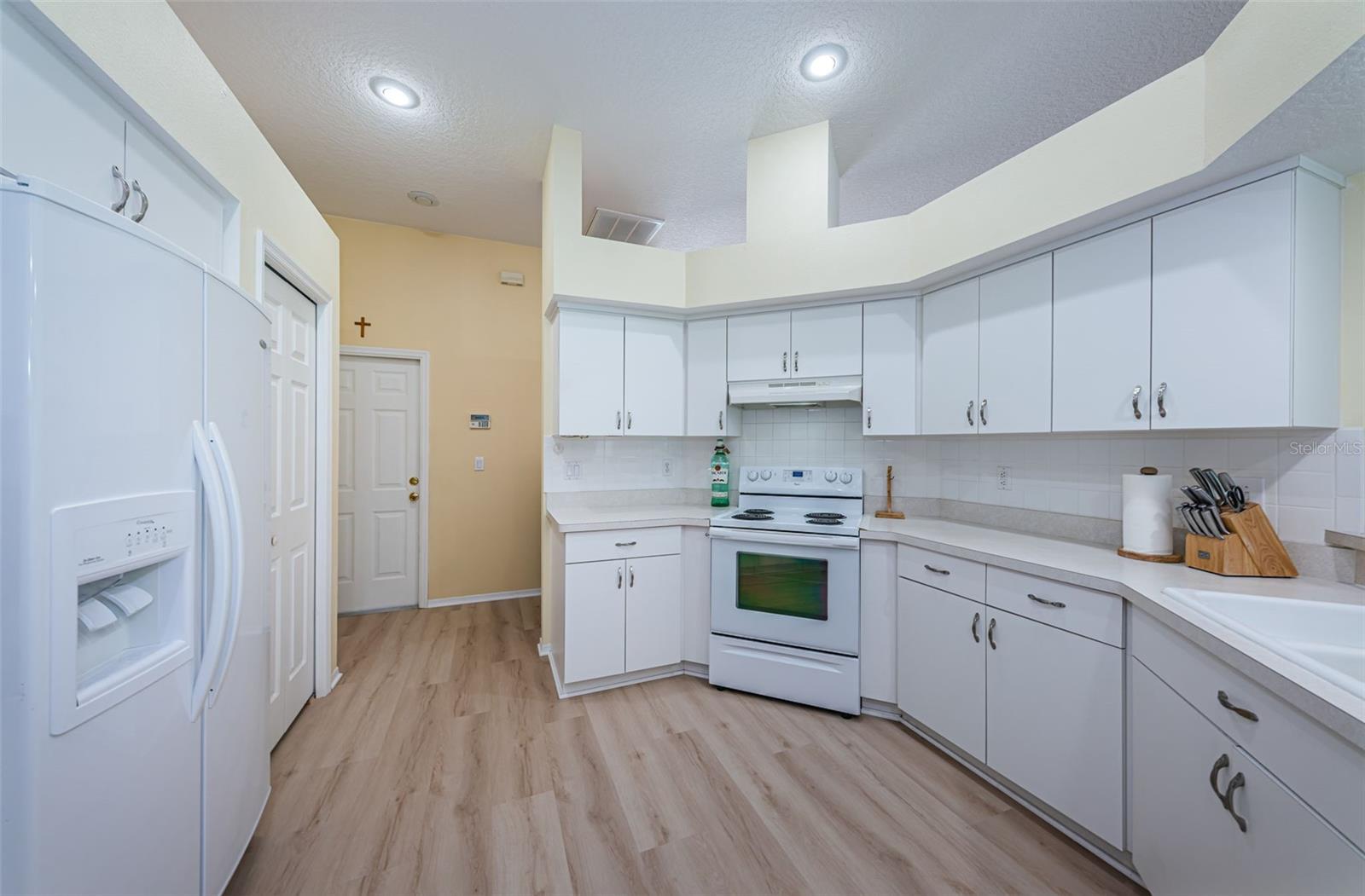 Recessed lighting - Brand new LVP floors throughout the home