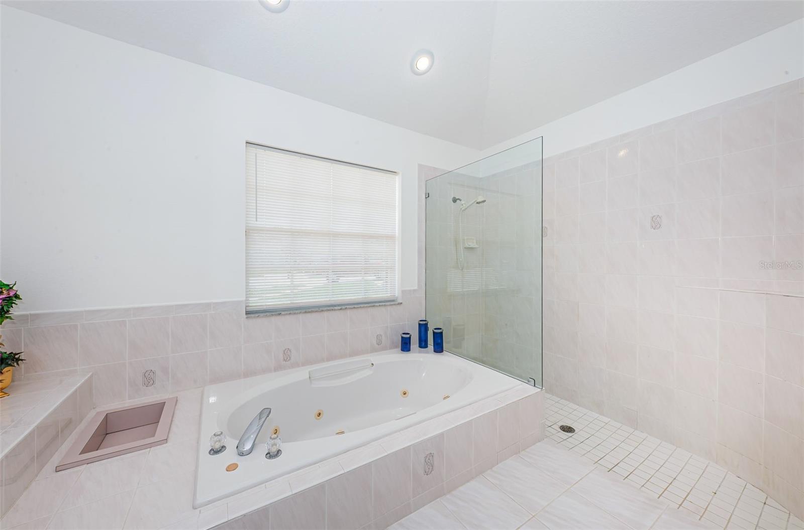 Primary bedroom bath - walk in shower. sunken tub