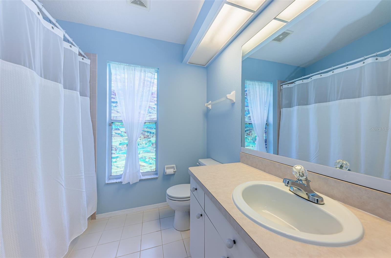 Bath #2, full tub/shower combination with full linen closet