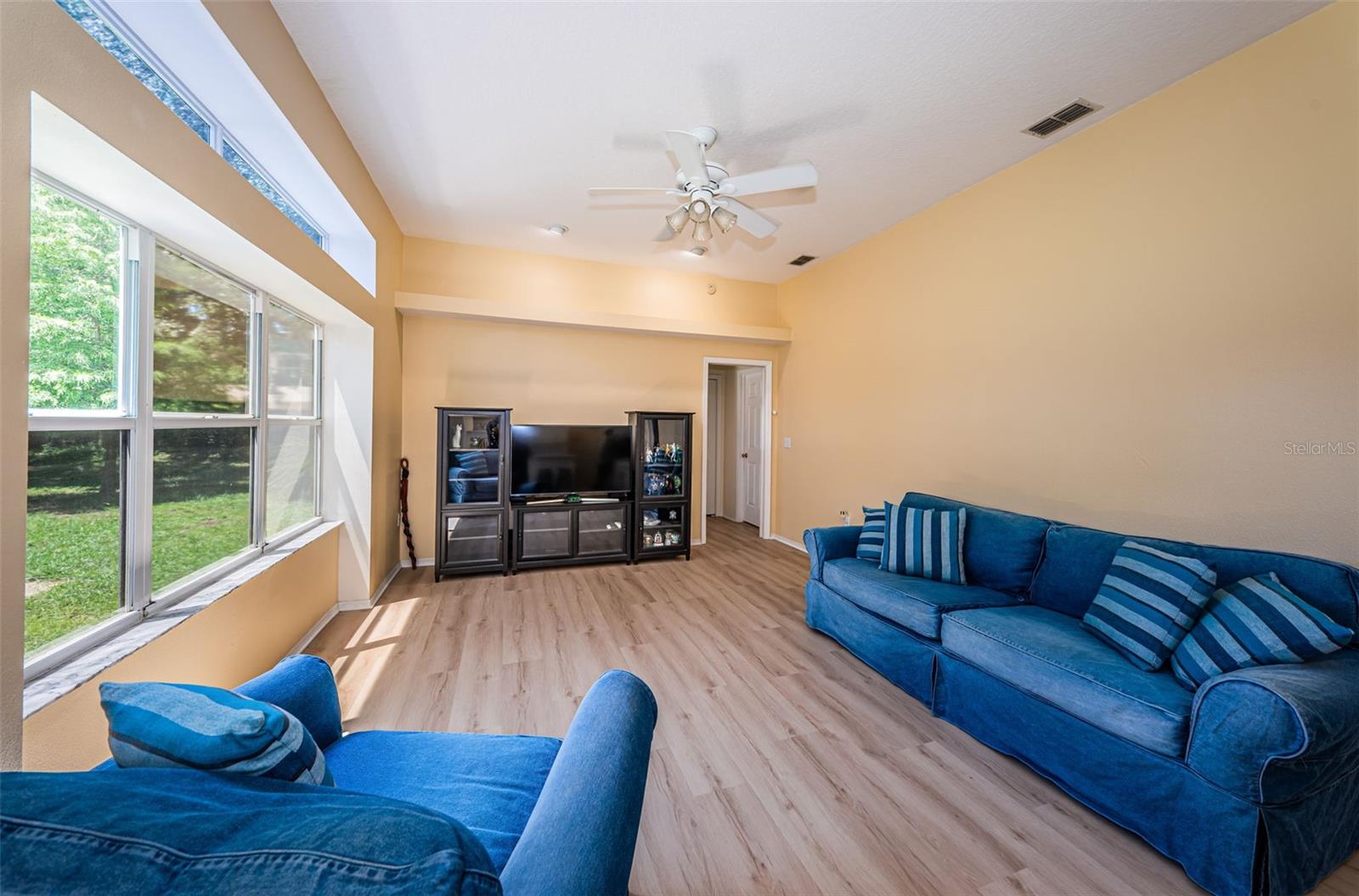 Family Room with backyard/pond/conservation views