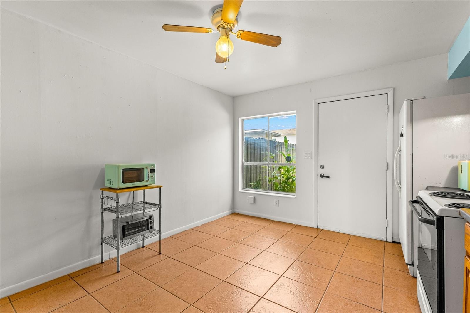 Kitchen opens to back patio