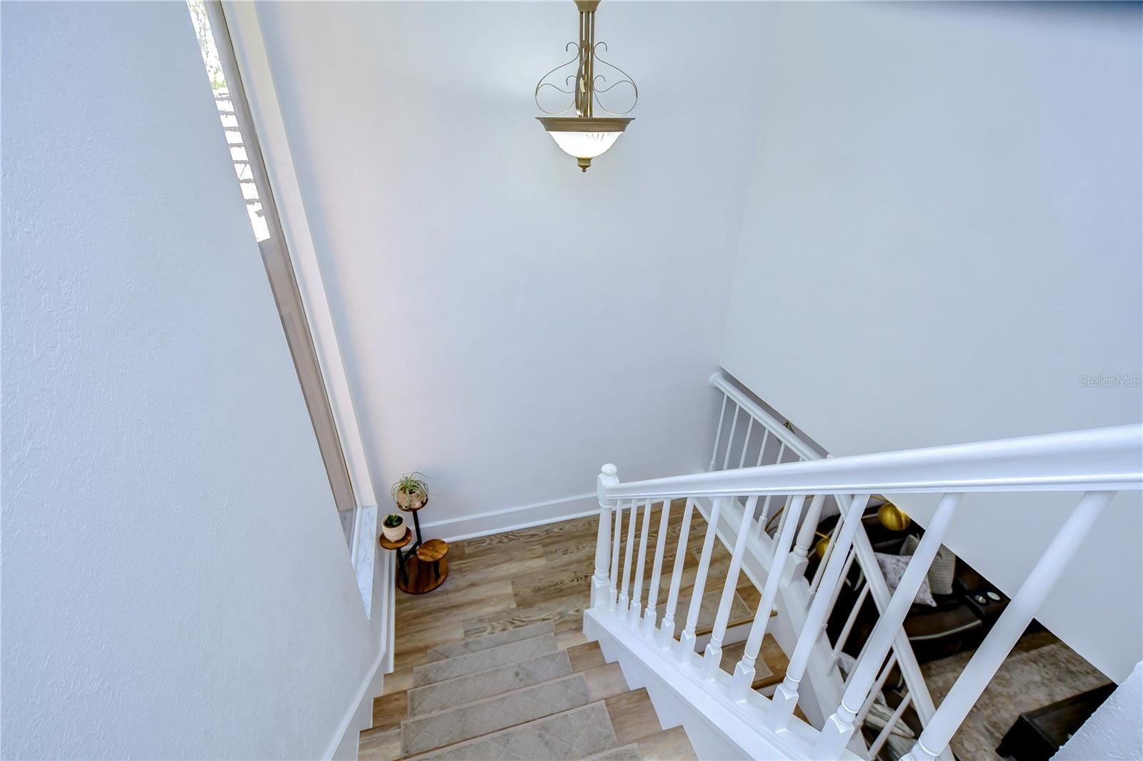 Staircase to Bedroom 2 and Primary Bedroom