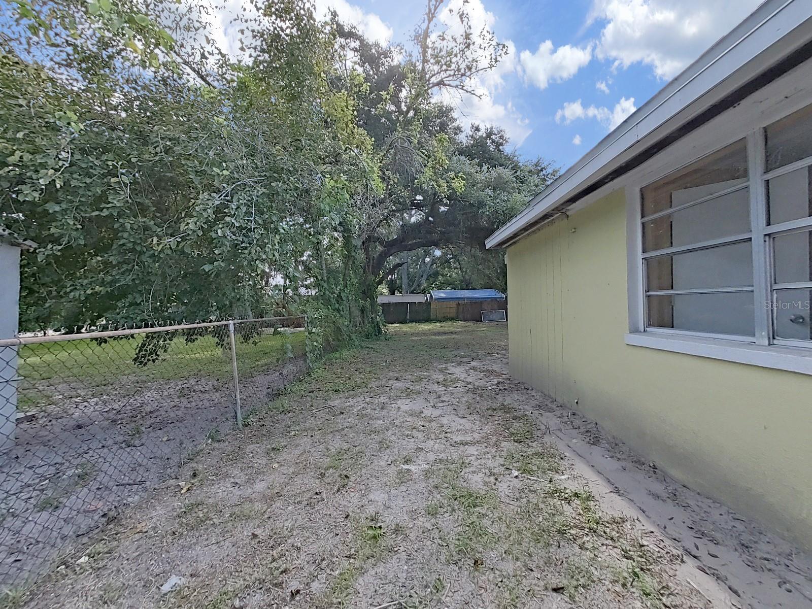 Side of home leading to backyard