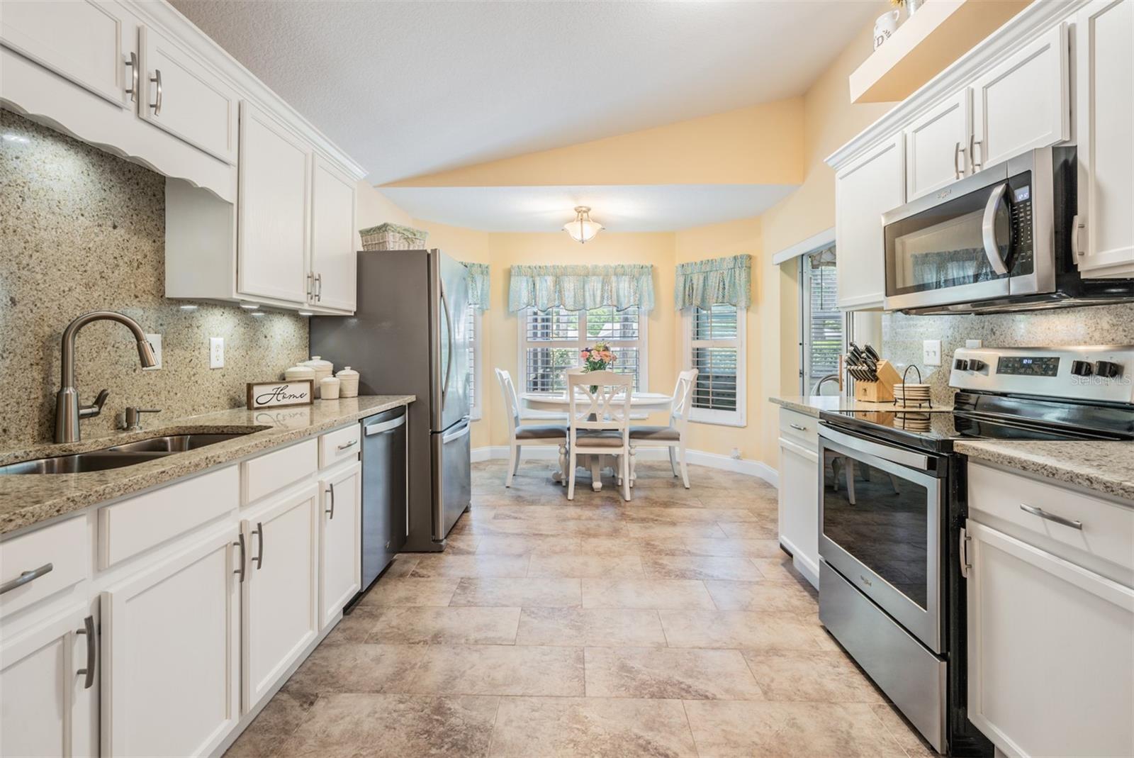 Galley kitchen with Granite counters & backspash!