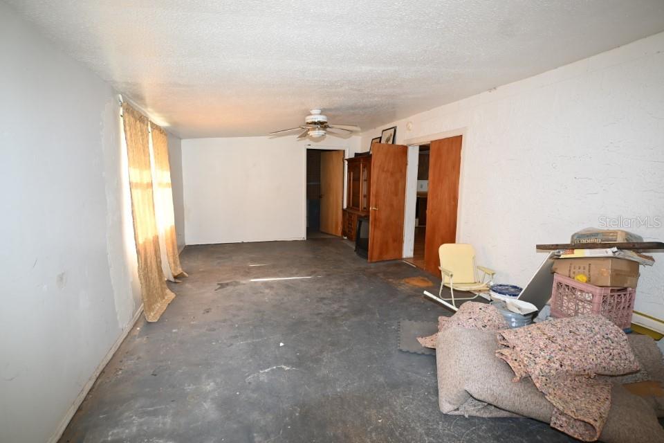 Main Home - enclosed rear porch (no HVAC)