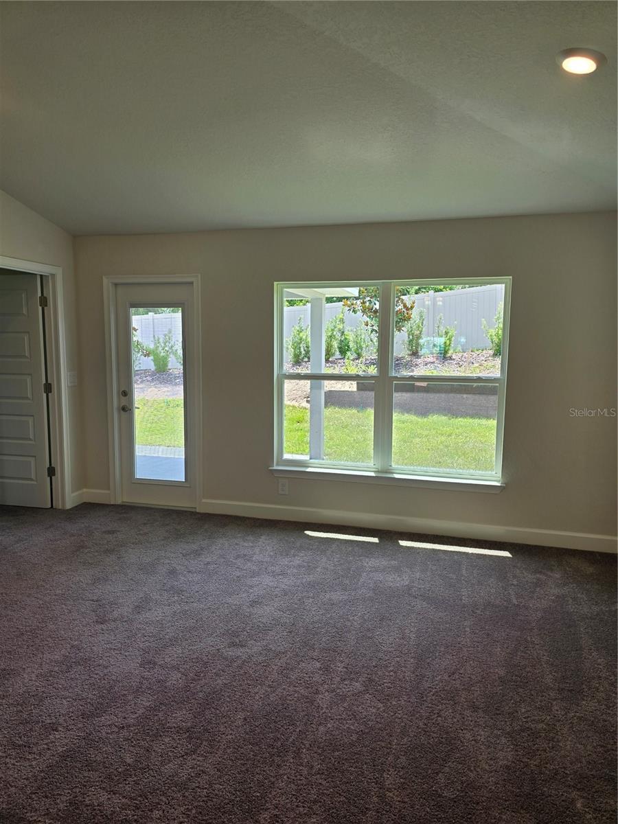 Family room walk out to covered patio