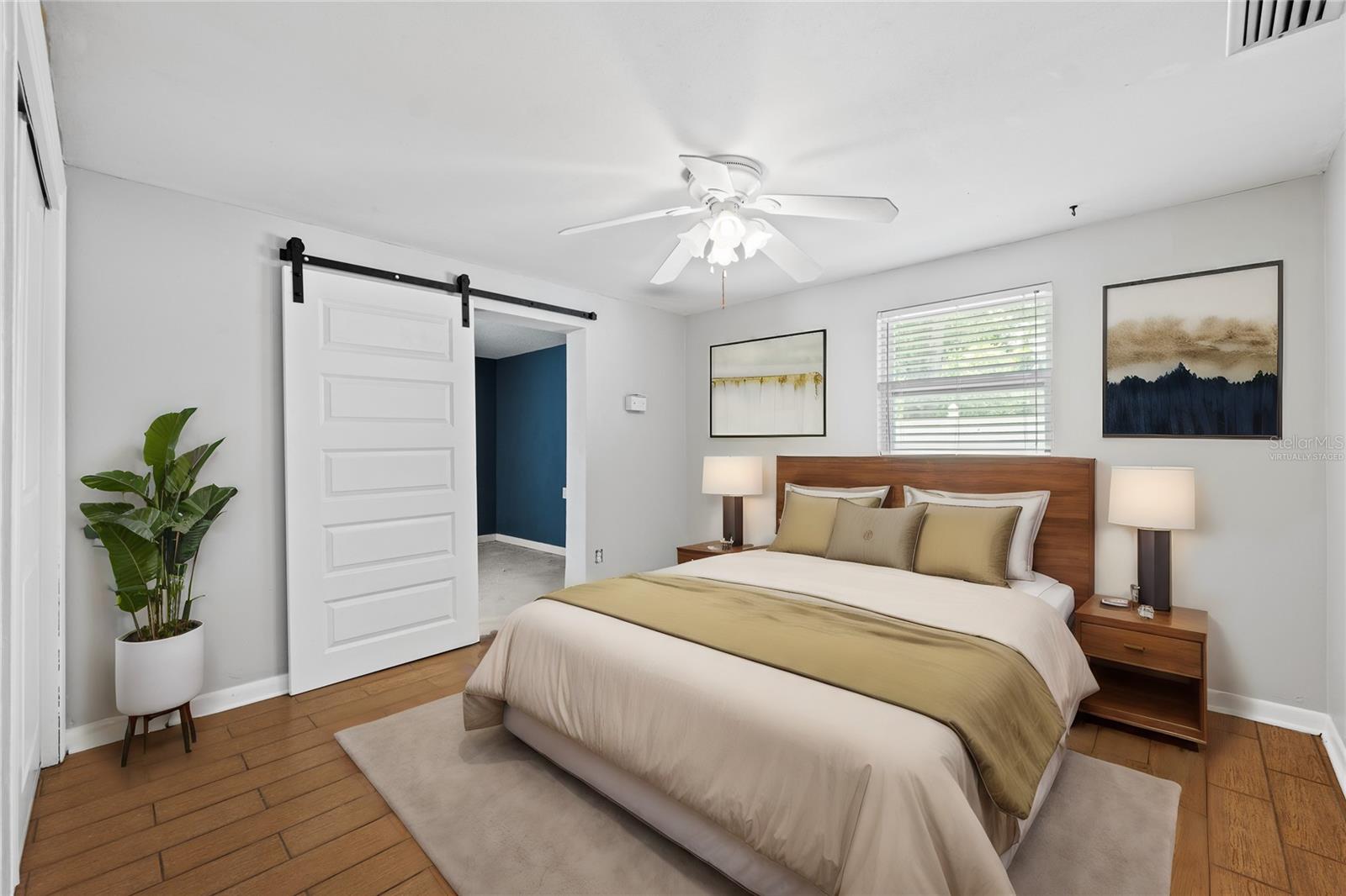 Secondary Bedroom in basement. This photo has been Virtually Staged.