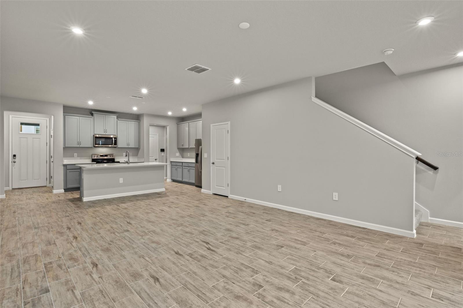 Great Room View of Dining and Kitchen