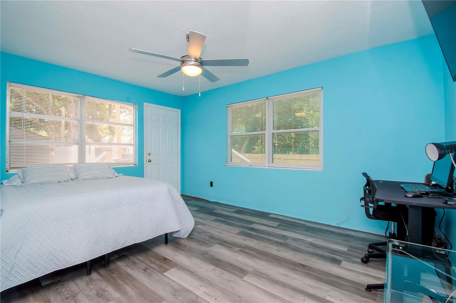 Bedroom 3 and door to the back deck.