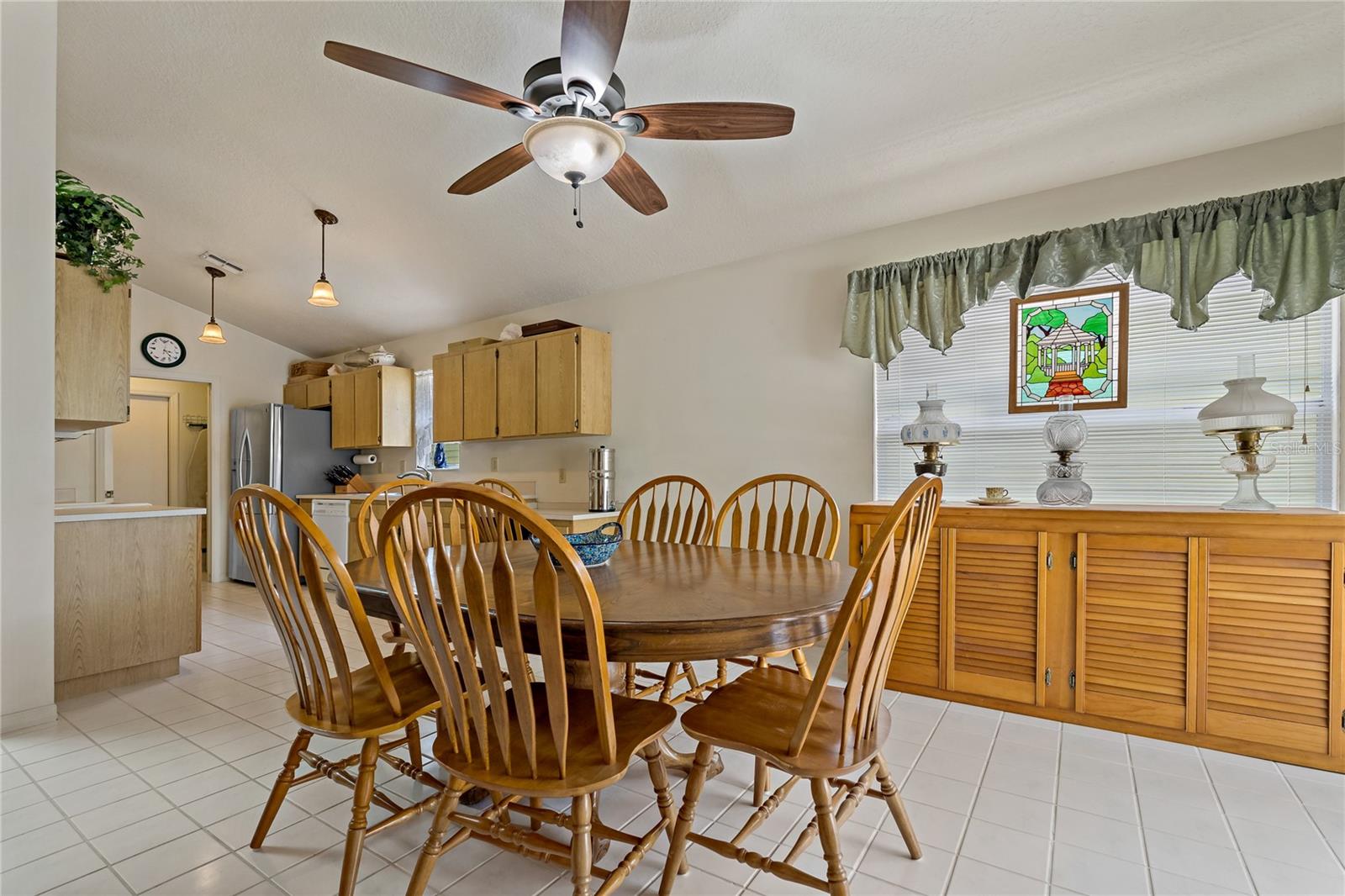 Large Dinette with Tile Floor and Lighted Ceiling Fan