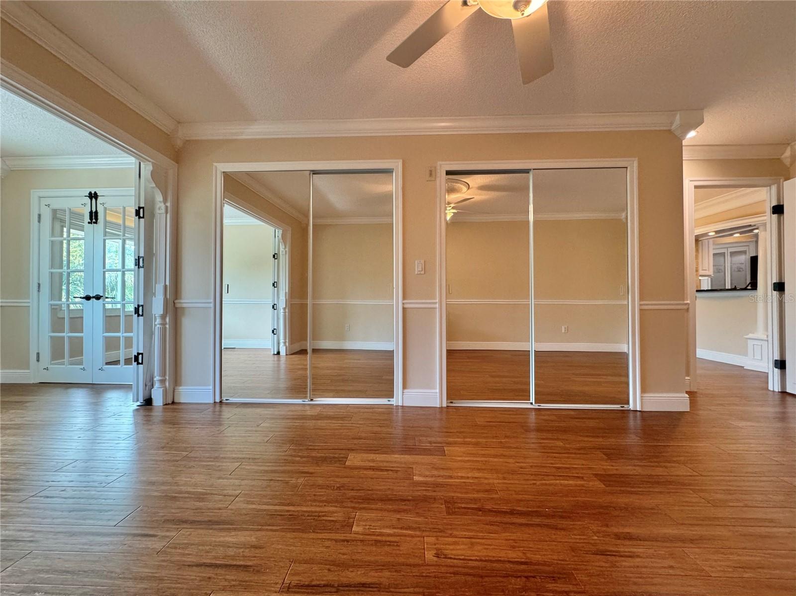 Primary bedroom has two standard closets and a walk-in closet.