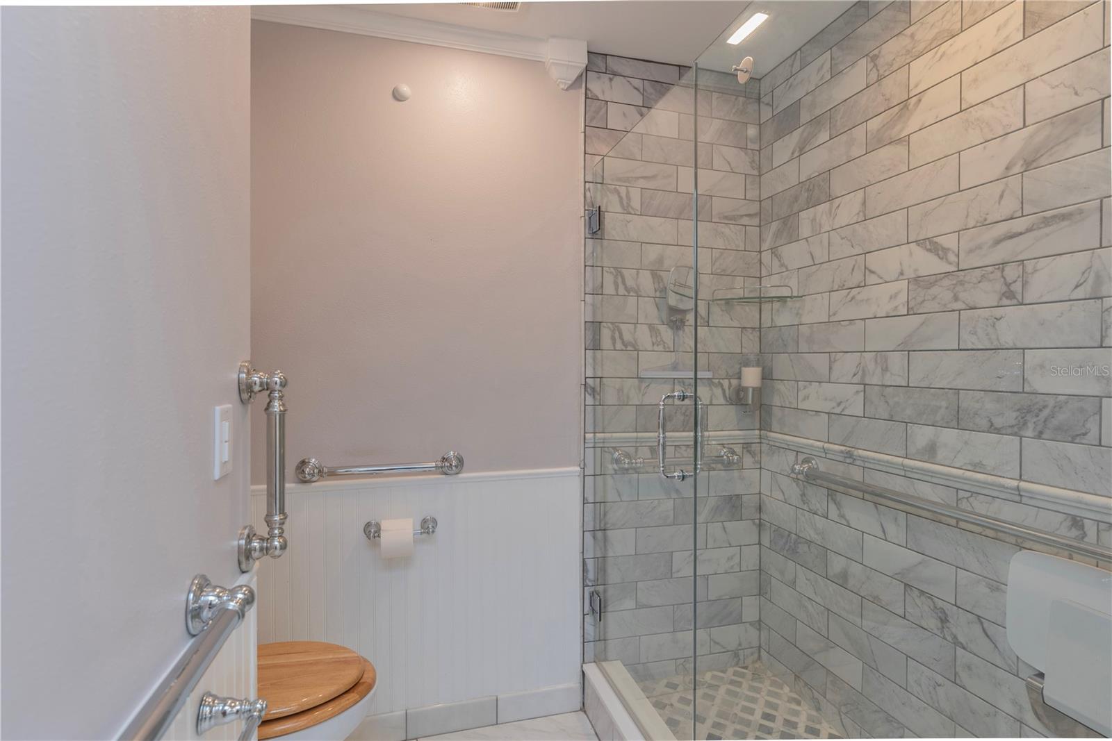 Primary ensuite bath with walk-in shower.