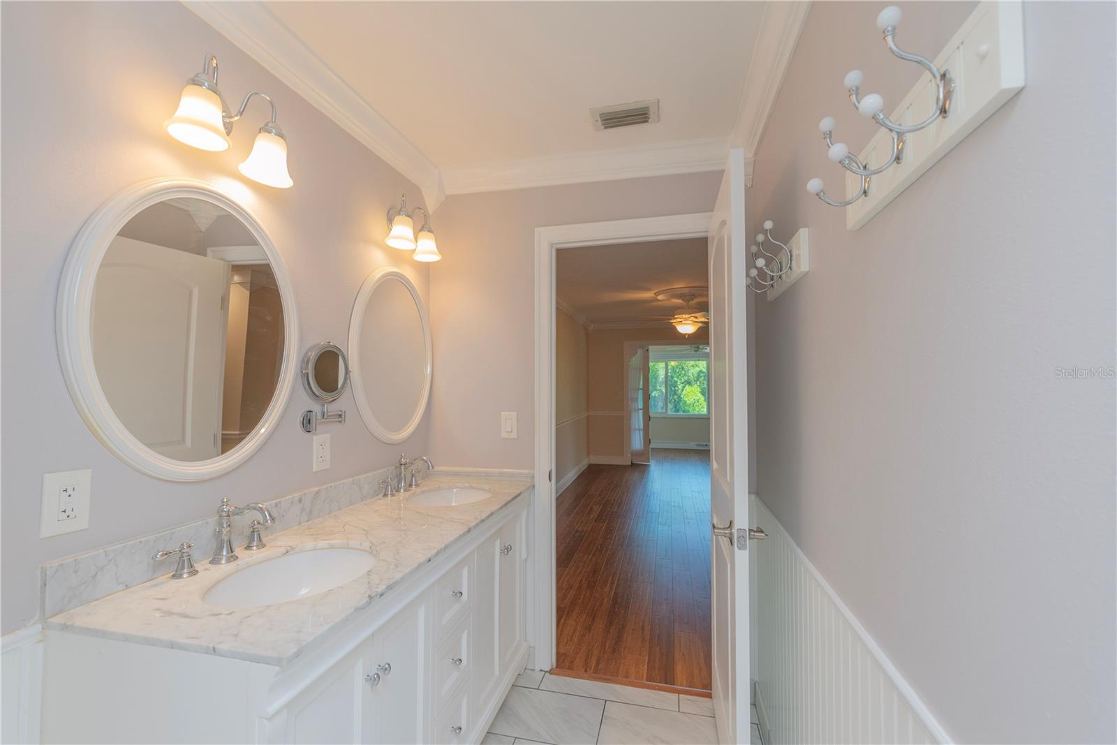 Primary ensuite bath with dual sinks.