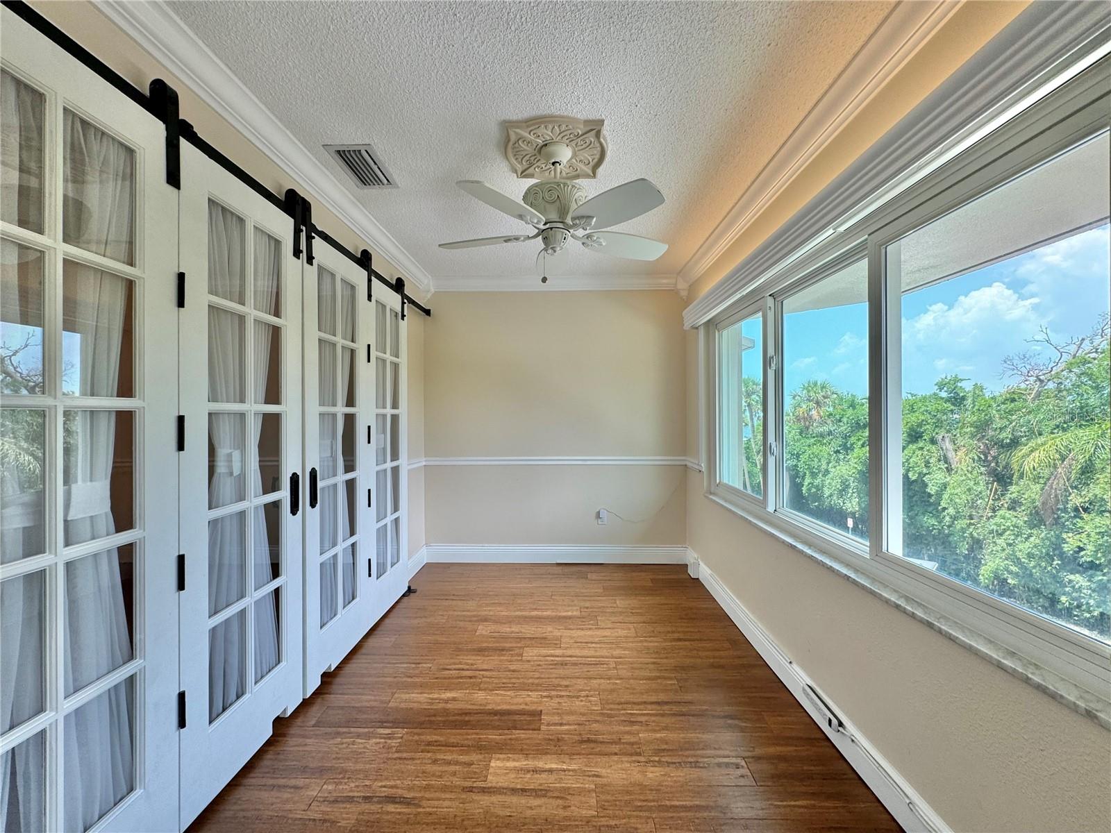 Sitting room with barn doors closed.