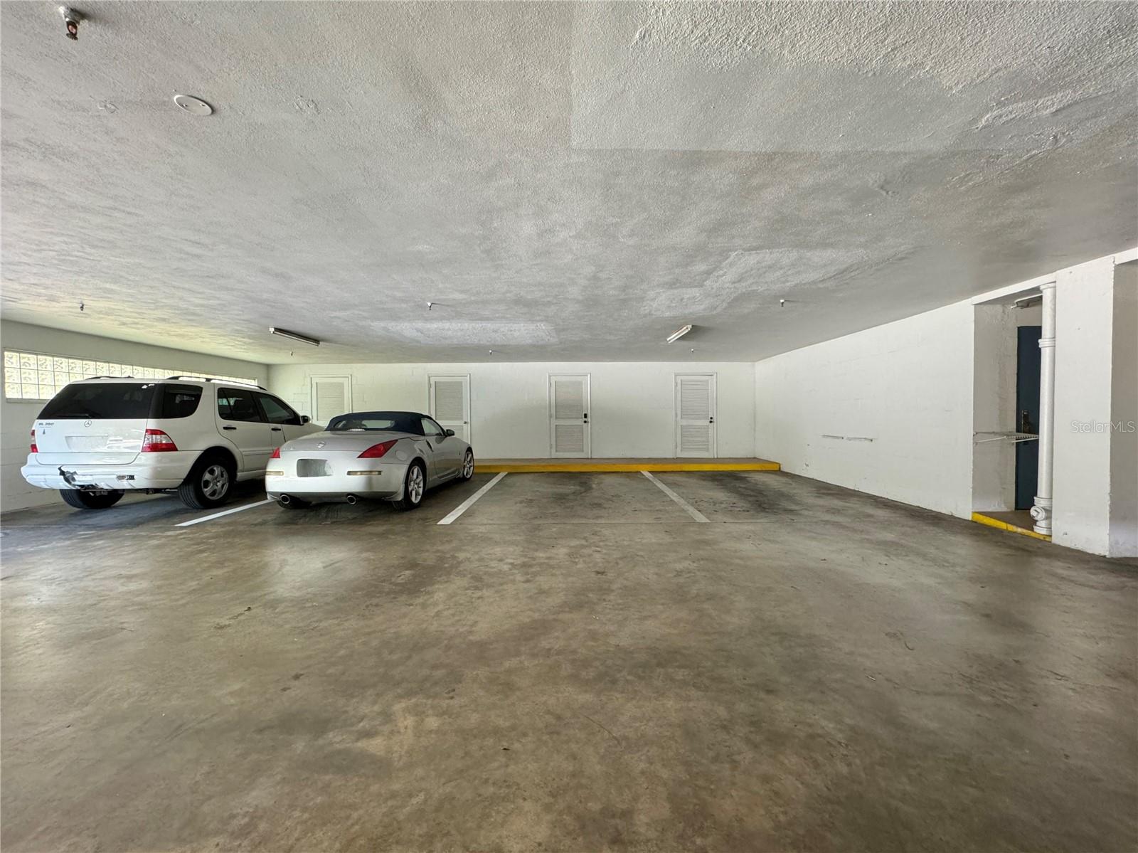 One designated parking space under building.